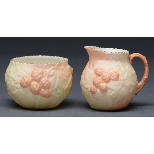 466 - A Locke & Co Worcester cream jug and sugar bowl, c1900, ovoid and moulded with brambles in shade... 