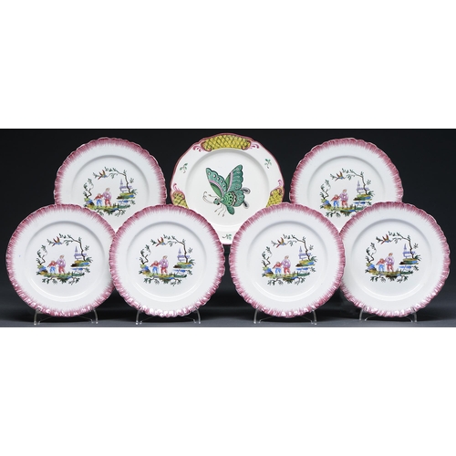 483 - One and a set of five Wedgwood Queens Ware plates, 1907 and circa, painted with a large green and pi... 