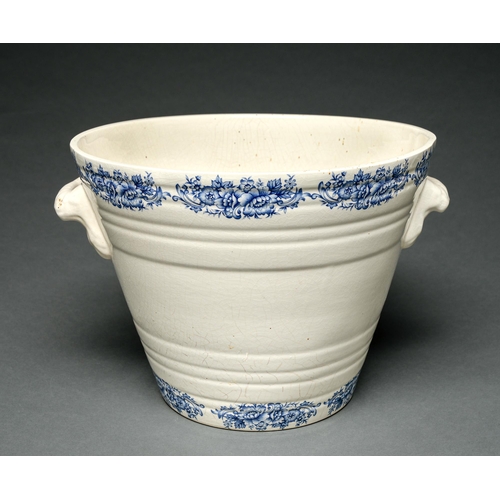 500 - A blue printed earthenware milk bowl, 20th c,  in Victorian style, 27cm h