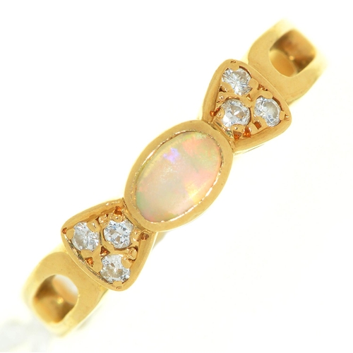 8 - An opal and diamond ring, in gold marked 18ct, 2.7g, size J½