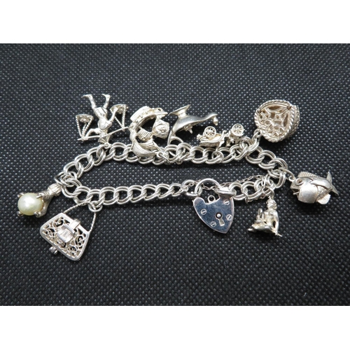 26 - Double link charm bracelet with 9x charms 45g