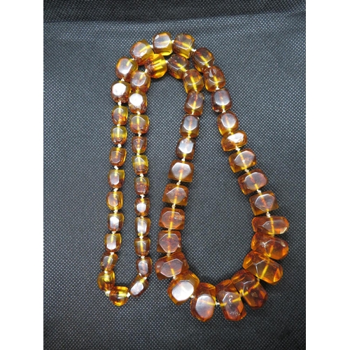 29 - Rope of amber beads