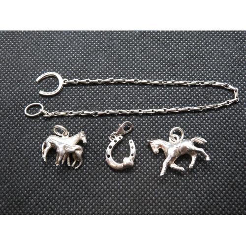34 - Vintage silver bracelet with horseshoe fastener and 3x equestrian charms