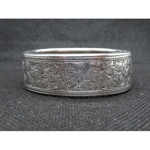 57 - Victorian child's bangle no HM engraved with Ivy leaves 2