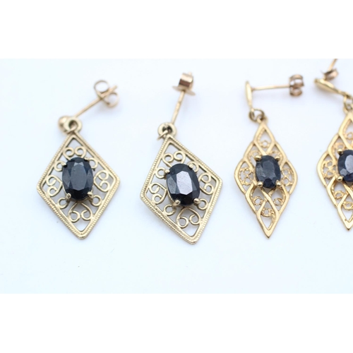 12 - 2 x 9ct gold stone set ornate earrings inc. sapphire, ornate (4.5g)