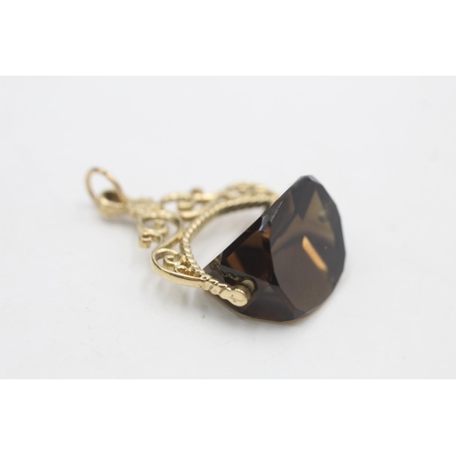 42 - 9ct gold vintage smoky quartz spinning fob pendant (6.3g)