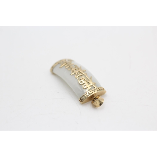 49 - 9ct gold jadeite oriental lucky pendant & earrings set (7.5g)