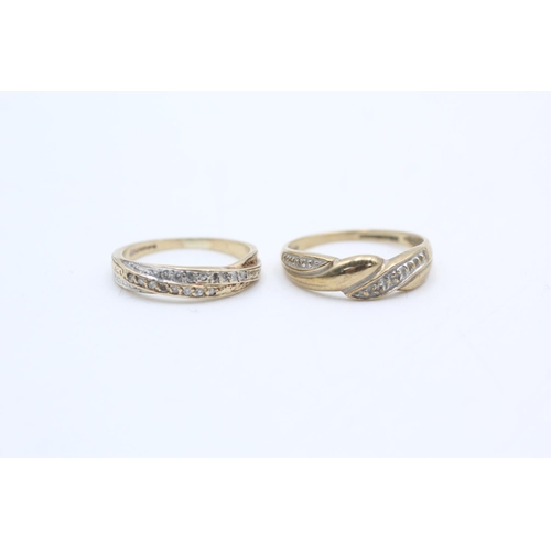 54 - 2 x 9ct gold diamond dress rings (3.2g)