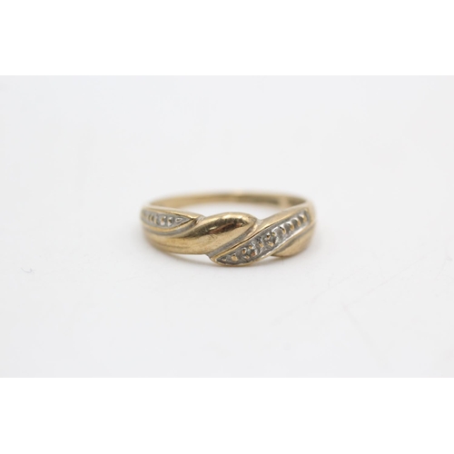 54 - 2 x 9ct gold diamond dress rings (3.2g)