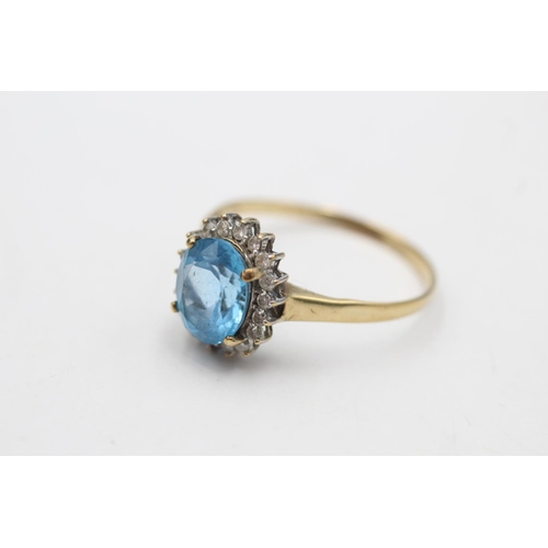55 - 9ct gold vintage topaz & diamond halo dress ring (2.9g)