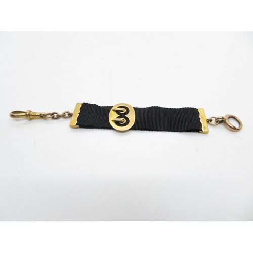 46 - Ladies 9ct gold and black cloth watch chain with clip and dog clip 8g total weight fully HM