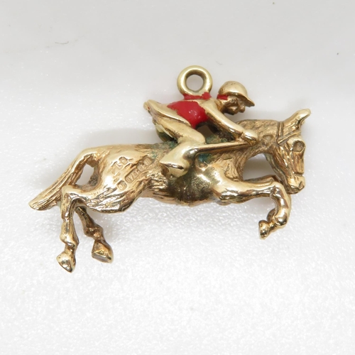 48 - 9ct gold and enamel horse and jockey charm 4.8g