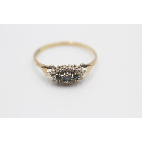 38 - 9ct gold diamond framed topaz ring (1.7g) Size V