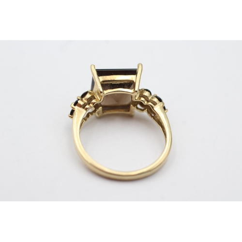40 - 9ct gold smokey quartz dress ring (3.5g) Size O