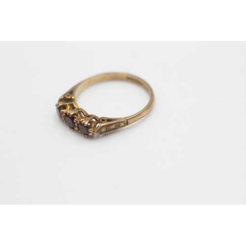 41 - 9ct gold garnet fronted ornate frame ring (1.6g) Size L