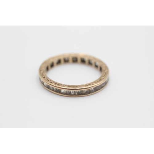 43 - 9ct gold synthetic spinel eternity ring (2.2g) Size P