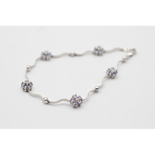 5 - 14ct white gold tanzanite & diamond stylised floral bracelet (4.7g)