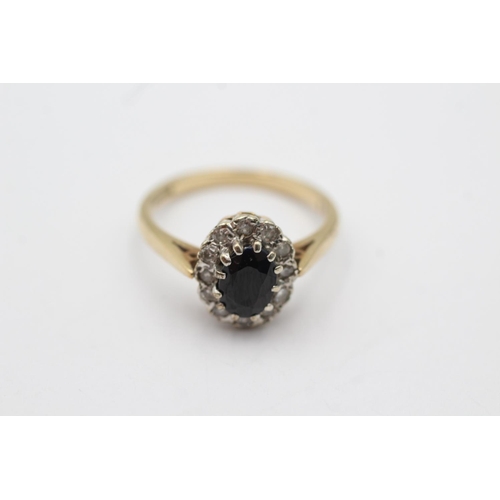 55 - 9ct gold diamond framed sapphire halo ring (2.8g) Size N