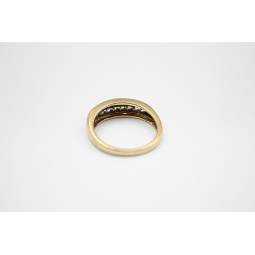 23 - 9ct gold topaz half eternity ring (3.1g) size N