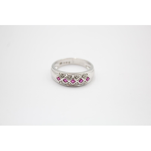 42 - 9ct white gold ruby & diamond fronted ring (3g) size N
