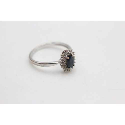 47 - 9ct white gold sapphire & diamond halo ring (1.6g) size J