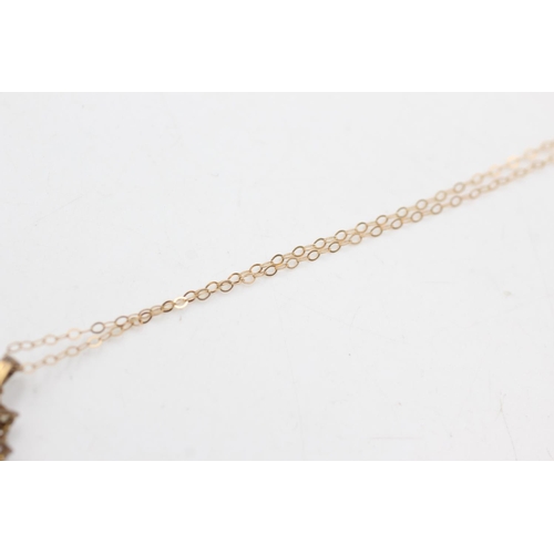 58 - 9ct gold & silver tanzanite & white sapphire pendant necklace (2.5g)