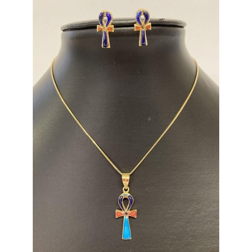 14 - An Egyptian 18ct gold Ankh shaped pendant with matching earrings, set with natural stones.  Pendant ... 