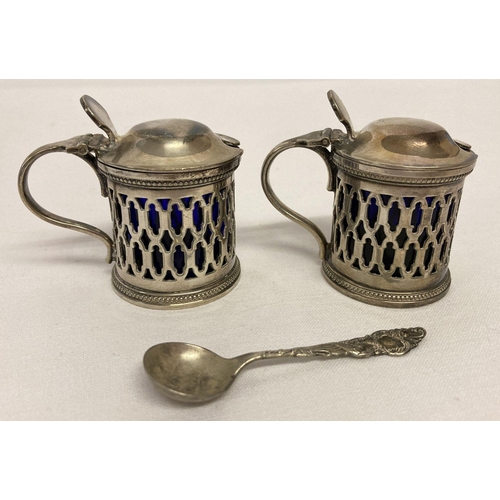 379 - A pair of Atkins Brothers Silver plated lidded salts with Bristol blue glass liners.  Together with ... 