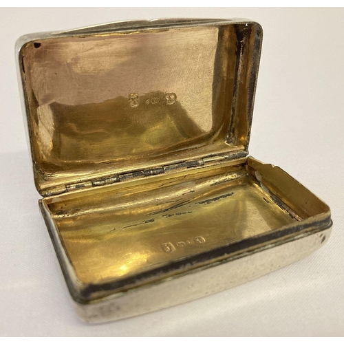 381 - An antique Georgian silver snuff box with curved base by Matthew Linwood Birmingham 1807.  Plain ext... 