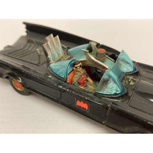 392 - Corgi Toys #267 Batmobile (1st issue), 1966 with red bat logo on gold hubs and no towing hook.  In e... 