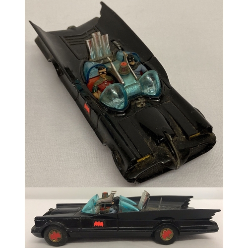 392 - Corgi Toys #267 Batmobile (1st issue), 1966 with red bat logo on gold hubs and no towing hook.  In e... 