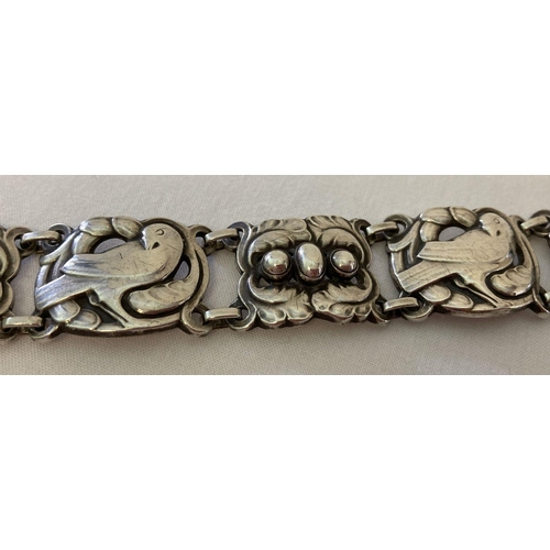 19 - A vintage Georg Jensen silver 6 link bracelet with dove & foliage motifs and 