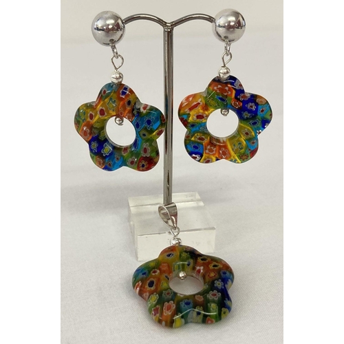 1006 - A glass flower shaped millefiori style pendant and matching earrings.  Each approx. 3cm diameter.
