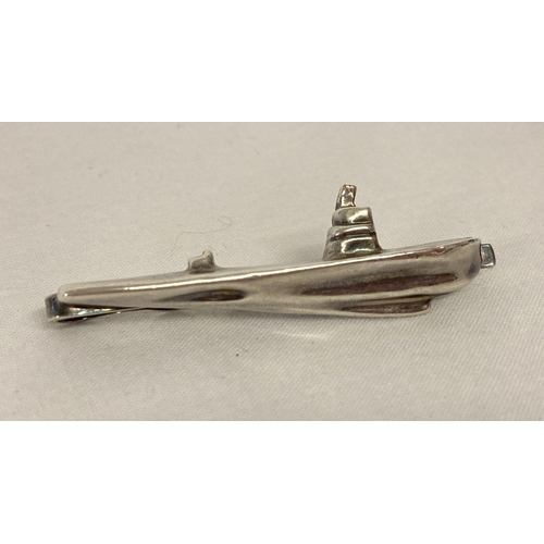 1009 - A white metal tie clip in the shape of a submarine.  Approx. 6cm long.