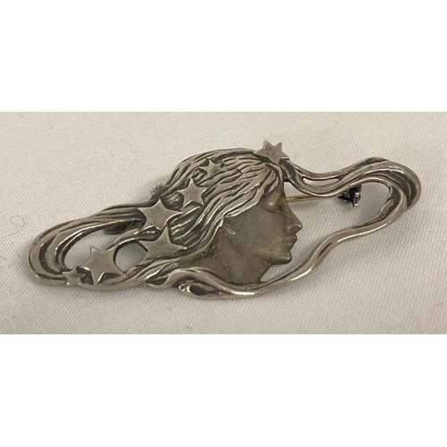 1011 - An Art Nouveau style white metal brooch. Indistinct mark to back. Approx. 5.5cm long.