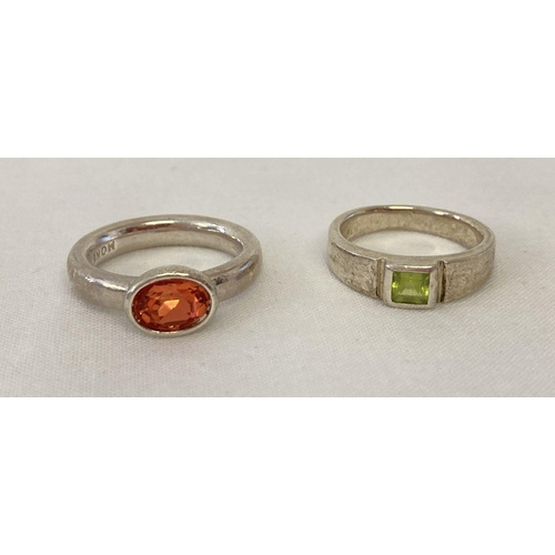 1037 - 2 silver rings. A modern design silver dress ring by Monet set with an oval cut orange spinel stone.... 
