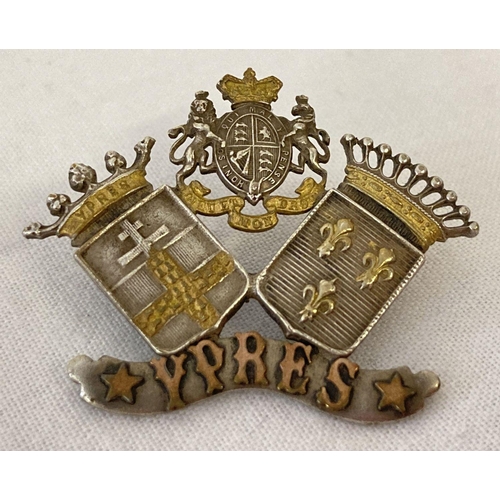 1041 - An antique white metal Ypres sweetheart brooch with gold coloured overlay detail. Depicting coat of ... 