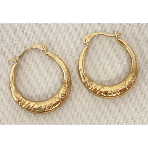 1050 - A pair of 9ct gold and diamond hoop style earrings with 