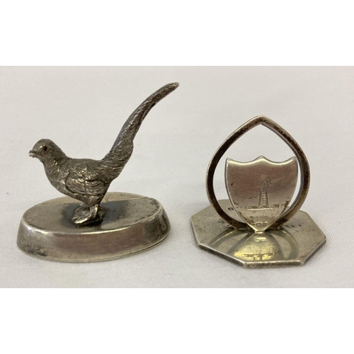 1111 - 2 Edwardian silver menu holders. A novelty silver pheasant holder by William Hornby, London 1908. To... 