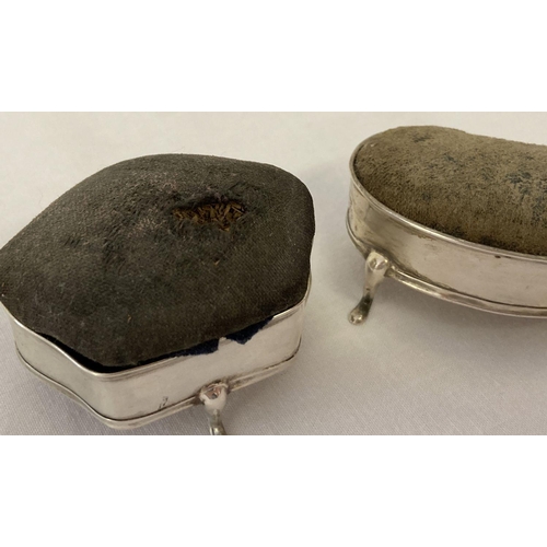 1112 - 2 Edwardian 3 footed silver pin cushions with blue fabric cushions (worn), both fully hallmarked. Wi... 