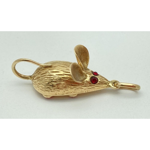 3 - A 14ct gold mouse shaped charm/pendant set with 2 small garnets for eyes & 4 small round coral stone... 