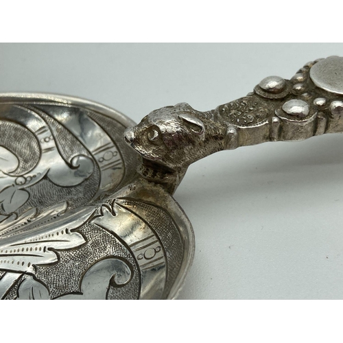 344 - A pair of Victorian Silver Mappin & Webb highly decorative serving spoons. Hallmarked to reverse of ... 