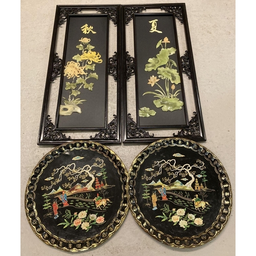 1114 - 2 oriental wooden wall hanging plaques with pierced work frames and lily pad and chrysanthemum decor... 