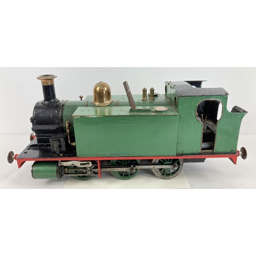 0-6-0 3½ ING Gauge live steam locomotive painted green, black and red. Brass features throughout. Vendor advises no boiler certificate. Approx. 25cm tall x 55cm long.