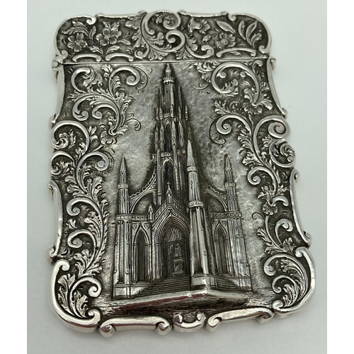 1073 - A Nathaniel Mills Victorian silver Castle Top card case featuring The Scott Memorial in relief. Full... 