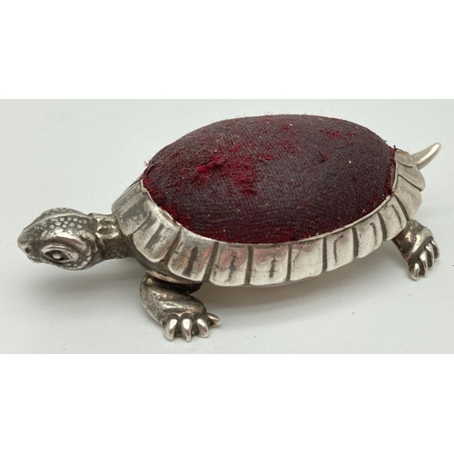 1078 - An Edwardian silver novelty pin cushion in the form of a tortoise with worn red fabric cushion. Hall... 