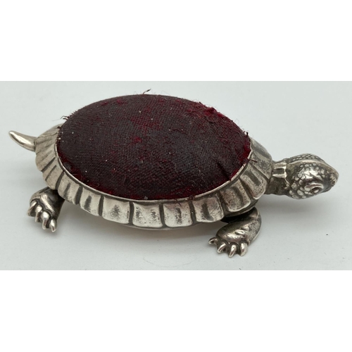 1078 - An Edwardian silver novelty pin cushion in the form of a tortoise with worn red fabric cushion. Hall... 