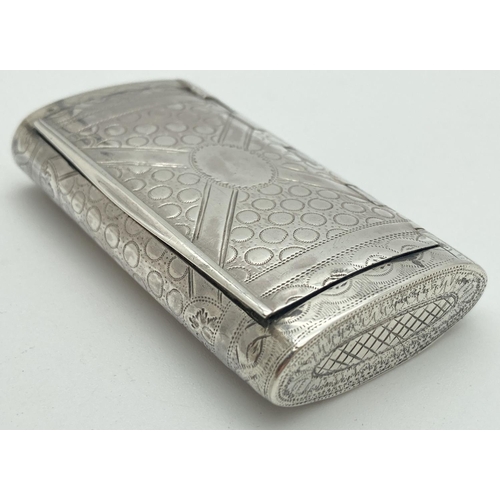 1180 - A Georgian silver rectangular cushion form snuff box By William Pugh. Engraved circular, cross and t... 