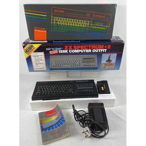 8 - A boxed Sinclair ZX Spectrum +2, complete with power pack, 16k Cheetah interface and instruction man... 