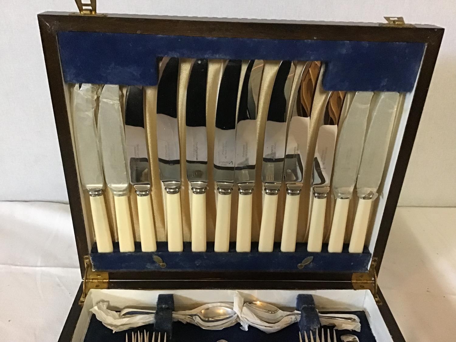 2 VINTAGE CANTEENS OF CUTLERY